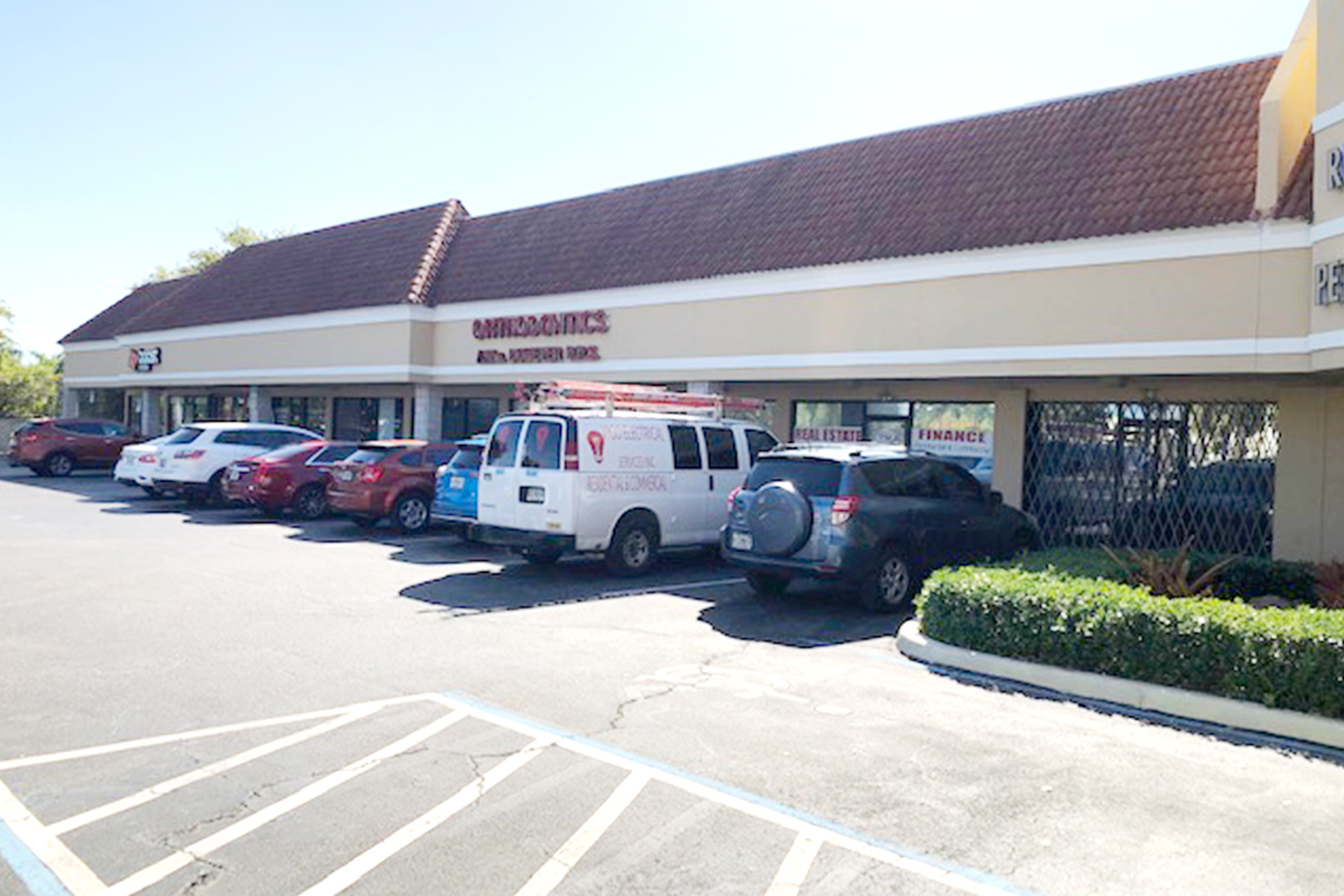 S4 Retail shopping center building showing storefronts and parking lot